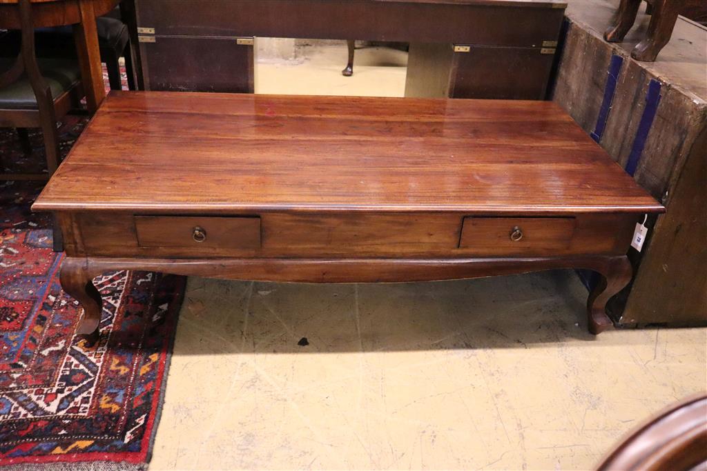 An Eastern rectangular topped hardwood coffee table, fitted two drawers, width 148cm, depth 74cm, height 45cm